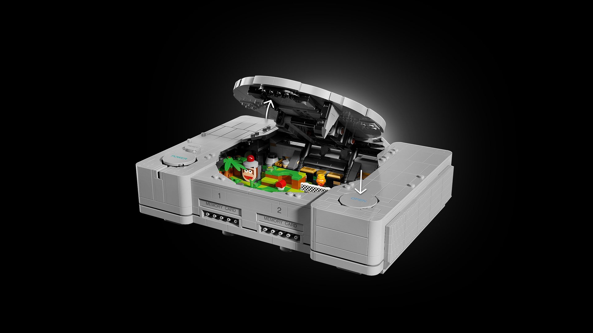 Geöffnete LEGO PlayStation 72306 mit sichtbarem buntem Diorama im Inneren der Konsole